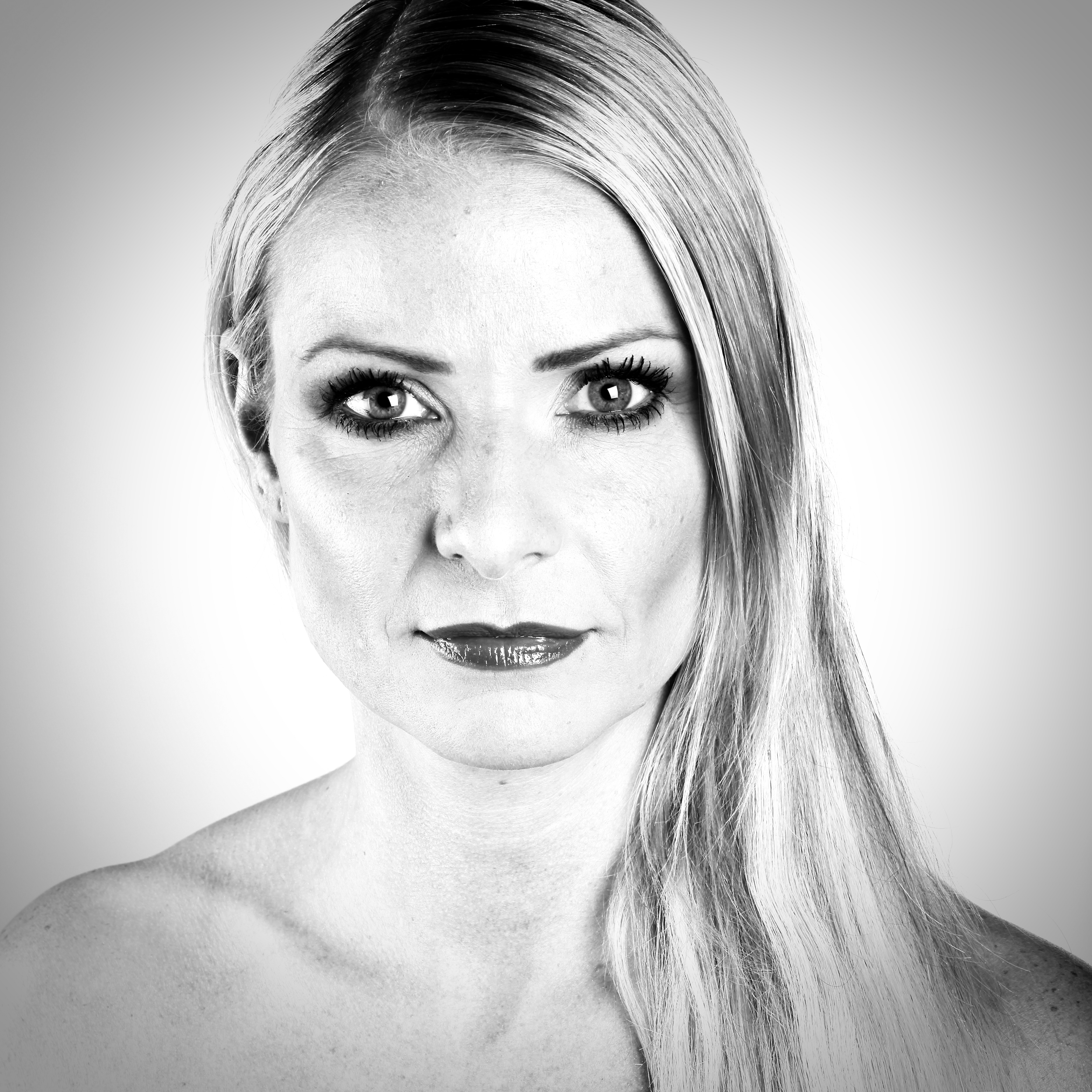 model with punk look staring unsmiling into camera. this photo acts as a a to the image profile of Jeanette Skibbe