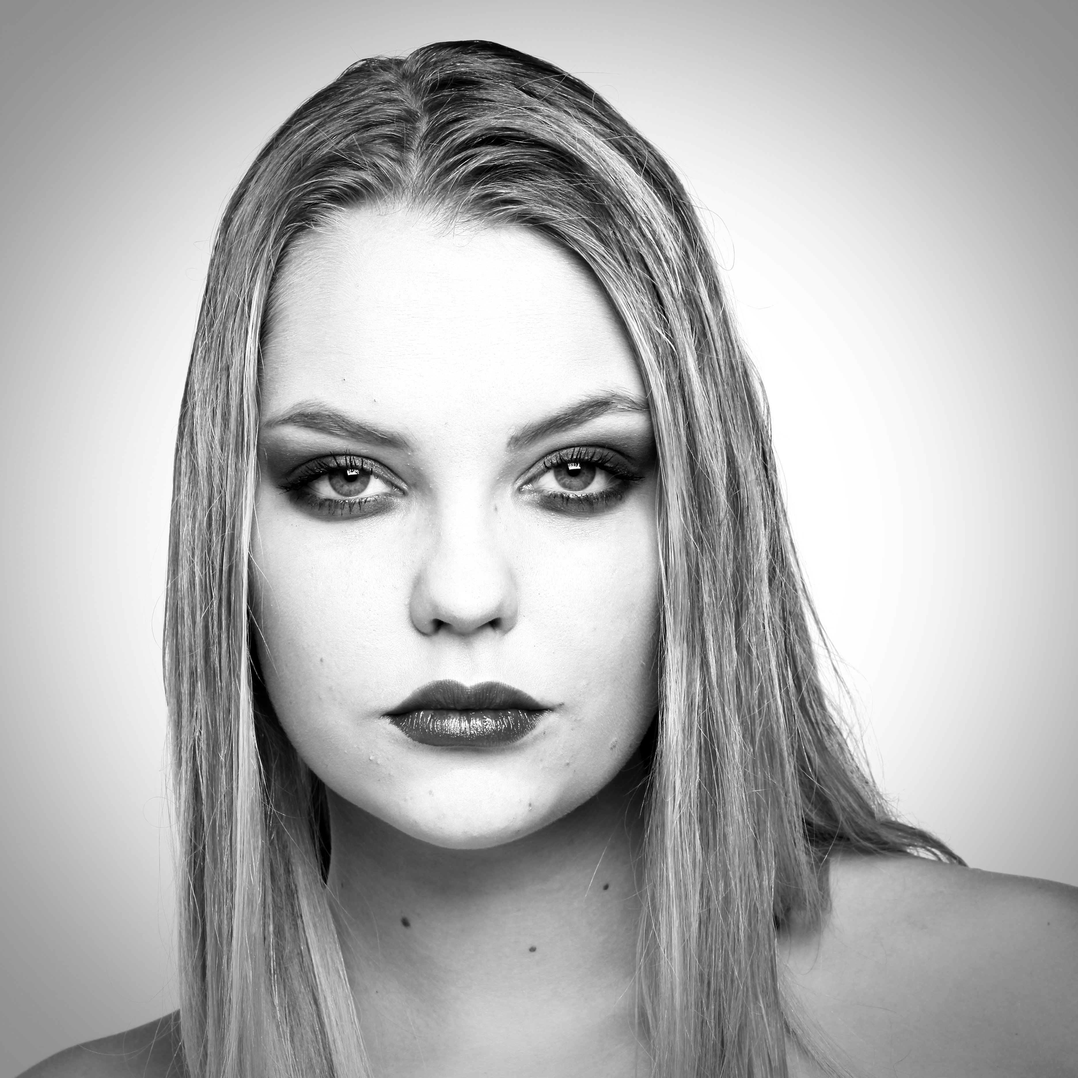 model with punk look staring unsmiling into camera. this photo acts as a a to the image profile of Jeanette Skibbe