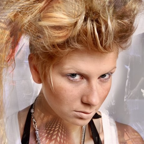 model with punk look staring unsmiling into camera. this photo acts as a a to the instagram profile of Jeanette Skibbe