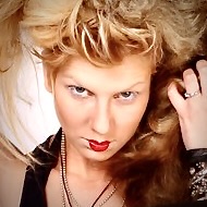 model with punk look staring unsmiling into camera. this photo acts as a a to the image profile of Jeanette Skibbe